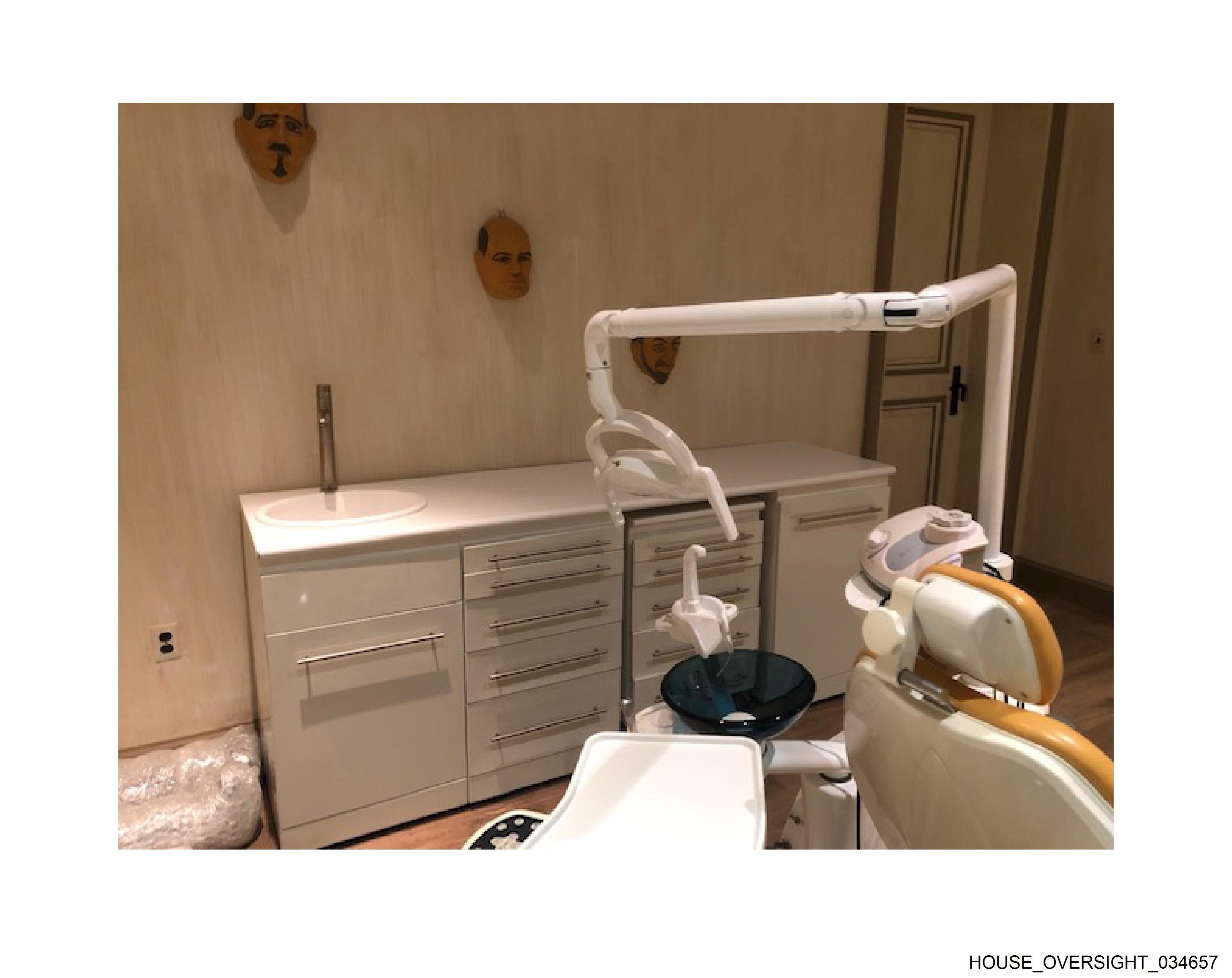 Dental room with masks on wall